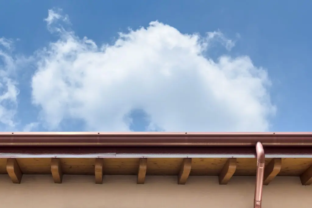Rain gutter along the edge of a roof